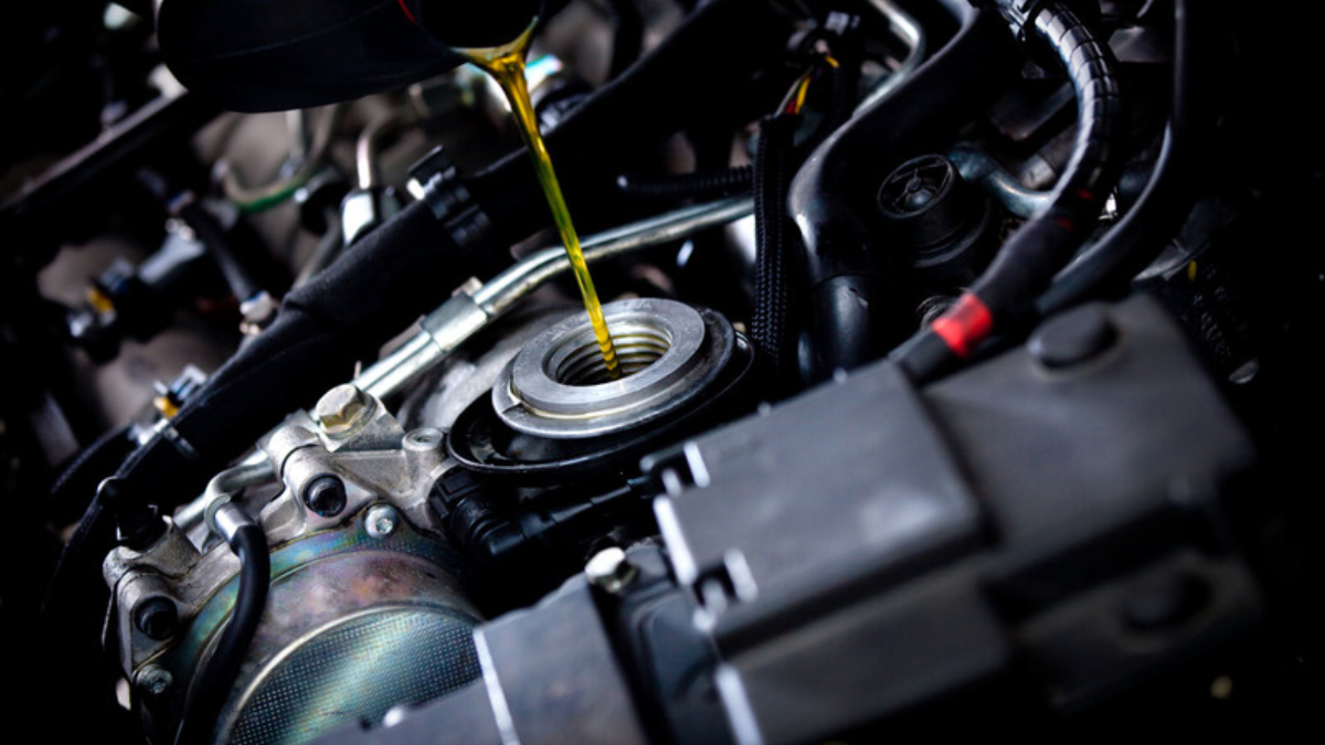 Engine oil being poured during service at The Tightened Bolt